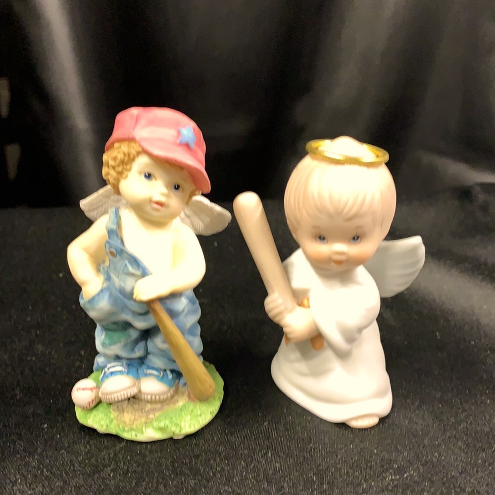 2 handcrafted porcelain Angels holding ball bats. Elegant sports themed decor.